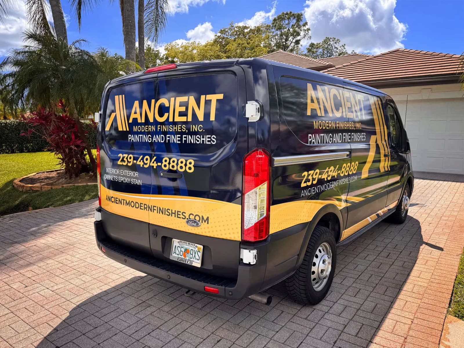 Ancient Modern Finishes van parked on a Naples driveway