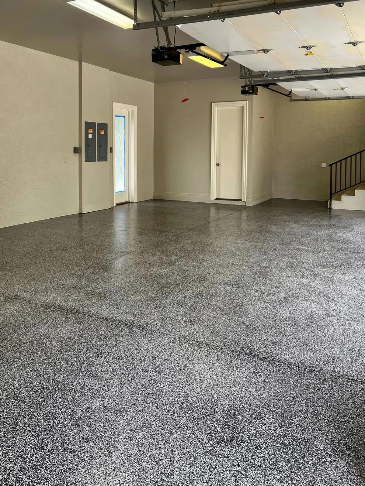 Flake epoxy garage floor finished wall to wall